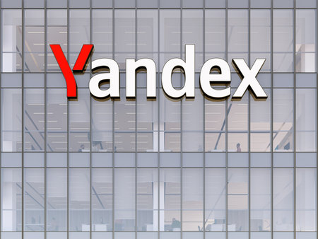 Moscow, Russia. May 2, 2023. Editorial Use Only, 3D CGI. Yandex Signage Logo on Top of Glass Building. Workplace of Technology Company Office Headquarters.のeditorial素材