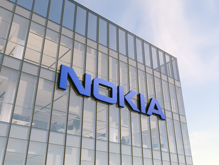 Espoo, Finland. May 2, 2022. Editorial Use Only, 3D CGI. Nokia Signage Logo on Top of Glass Building. Workplace Telecommunications Equipment Company Office Headquarters.のeditorial素材
