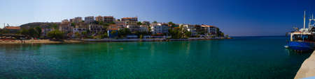 A beautiful bay with crystal clear water on the island of Kos in Greeceの写真素材