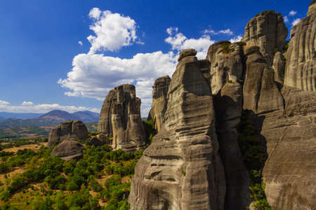 Beautiful scenery of cliffs at the edge of the beautiful valley of Meteora.
In ancient and high cliffs are ancient monasteries.の写真素材