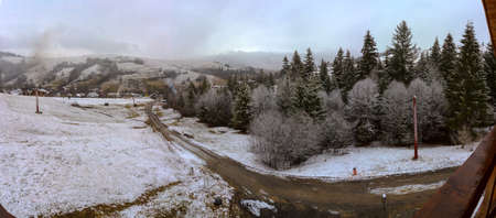 Typical Ukrainian Landscape Winter in the Ukrainian Carpathians. Severe snow-covered rocks. Poloniny. Grass. Haystacks. Highlands.の写真素材