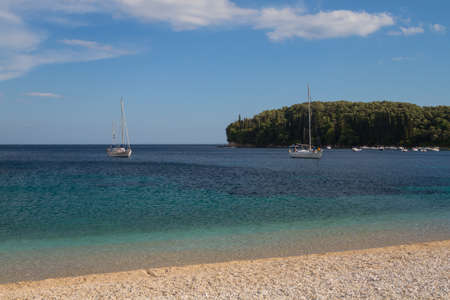 Unreal landscapes, nature, clouds, sea, mountains.Clear sea water, blue sky, houses, olives and all you expect from Greece!のeditorial素材