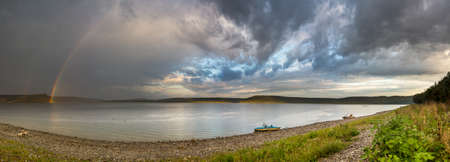 Double rainbow over the reservoir, Bakota. Archaeological excavations show that since ancient times, along the banks of the Dniester, many pagan sanctuaries and temples, as well as burial women's burial places were located on this place, which indicates tの写真素材