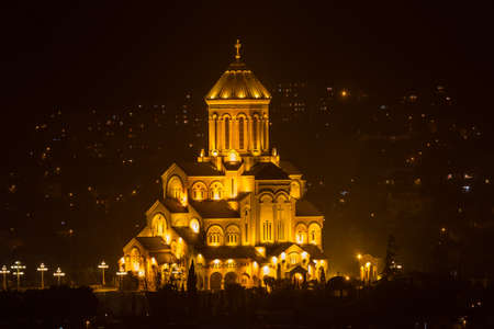 Night views of Tbilisi from the fortress. Tsminda Sameba is the main cathedral of the Georgian Orthodox Church, which is located in Tbilisi, on the hill of St. Ilya.の写真素材