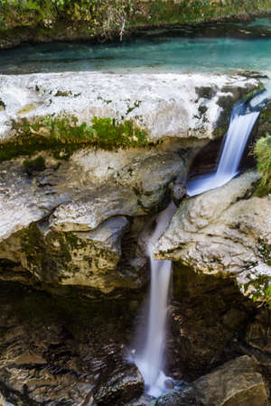 Martvil Canyon, Georgia, Kutaisi. Blue river, lakes with transparent water, waterfalls, canyon walls, overgrown with moss.の写真素材