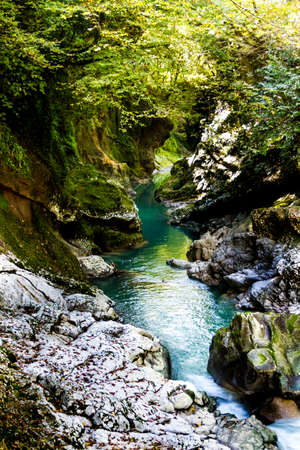 Martvil Canyon, Georgia, Kutaisi. Blue river, lakes with transparent water, waterfalls, canyon walls, overgrown with moss.の写真素材