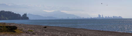 View of Skyscrapers Batumi on the background of surrounding mountainsの写真素材