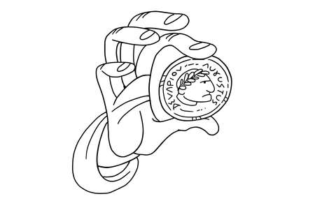 Hand holds silver ancient roman coin with the image of emperorの写真素材