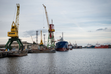 Ship and port cranes at repair area.