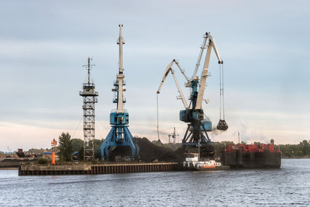 Coal transshipment to container ships.の写真素材