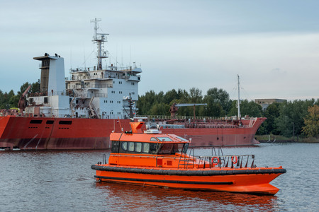 Pilot expected of going ship to enter the port.の写真素材