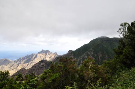 Mountain road to volcano Teide among rocky mountains on Tenerife island, Spainの写真素材