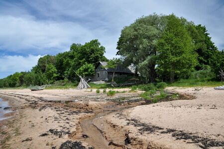 The old fisherman's house on the beach.の写真素材