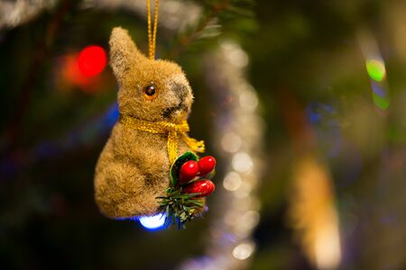 Hare with red berries. Christmas tree decorations.の写真素材