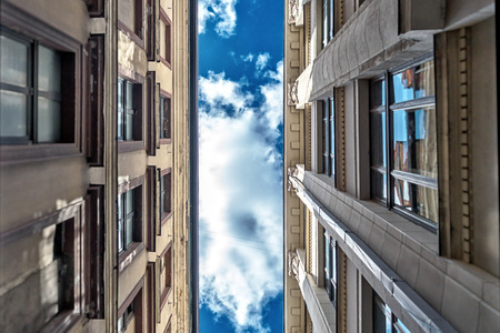 Urban scene. View up between the houses.の写真素材