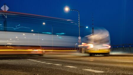 Urban night scene. Evening traffic in the streets.の写真素材
