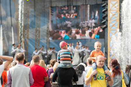RIGA, LATVIA - AUGUST 17, 2014: People on the streets of Riga City Festival. Festive concert.のeditorial素材