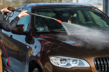 Car without touch washing self-service. Wash with water and foam.の写真素材