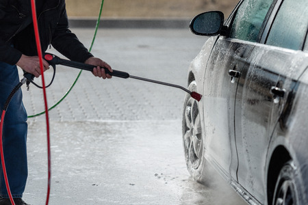 Car without touch washing self-service. Wash with water and foam.の写真素材