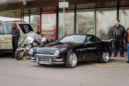 RIGA, LATVIA - APRIL 28, 2018: 2018 Moto Season Opening Event. An exclusive self-made car parked on the side of the motorcycle's squadron.のeditorial素材