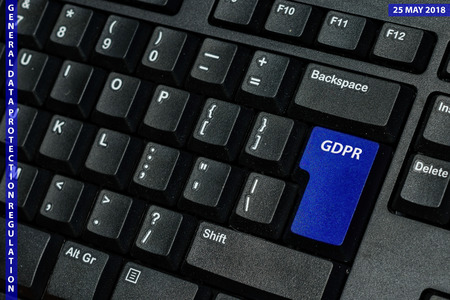 blue keyboard key with text GDPR as symbol for Privacy and General Data Protection Regulation on a notebook computerの写真素材