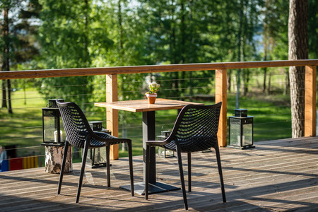 Chairs and table cafes on the outdoor terrace.の写真素材