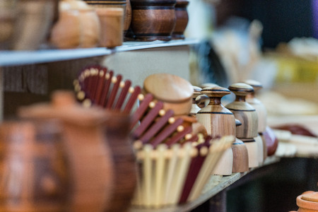 Various wooden products in the souvenir shop window.の写真素材
