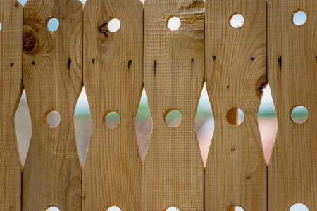 Close-up photography  of a decorative wooden fence.の写真素材