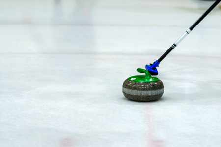 Close up of a Curling game situation.の写真素材
