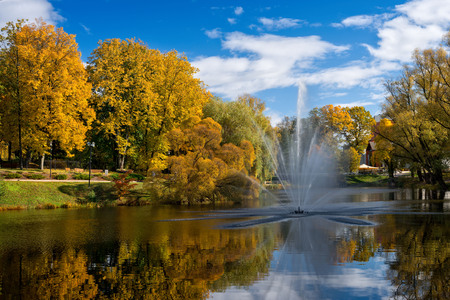 Valmiera. Latvia. City autumn landscape with a pond and fountain.の写真素材
