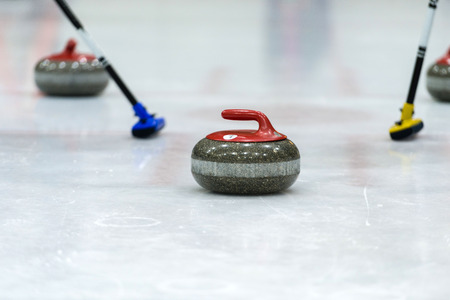 Close up of a Curling game situation.の写真素材