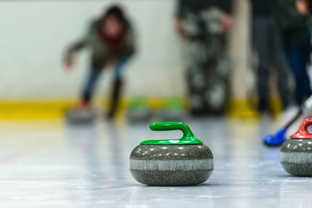 Close up of a Curling game situation.の写真素材