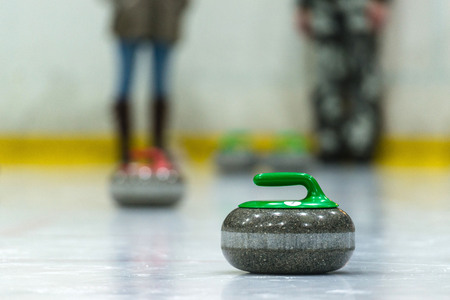 Close up of a Curling game situation.の写真素材