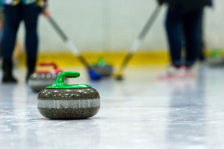 Close up of a Curling game situation.の写真素材