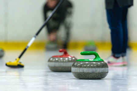 Close up of a Curling game situation.の写真素材