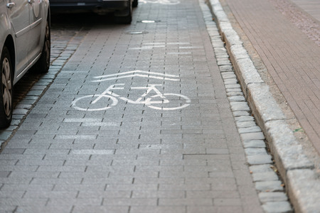 Cobbled street with  separate lanes for cyclists.の写真素材