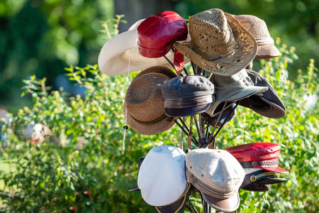 Stand with hats in the crafts market.の写真素材