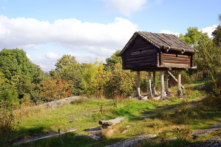 The autumn landscape of the Swedish countryside with meadows and ancient buildings.の写真素材