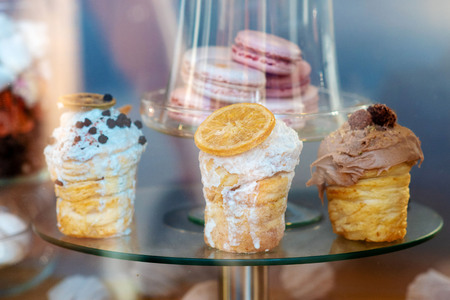 Different sweets in the confectionery store window.の写真素材