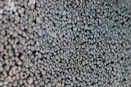 Selective focus close up photograph. Abstract background. Wall side view.の写真素材