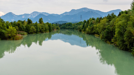 Forest river reflection landscape. Autumn forest river water panorama. Forest river reflection in autumnの写真素材