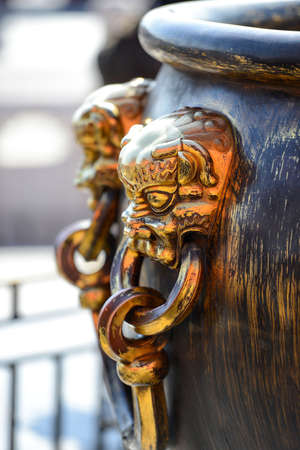 Shinning Chinese brass lion-head large-bowl handle at The Forbidden City in Beijing, Chinaの写真素材