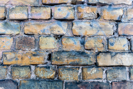 Front close-up view of a old brick wall - Imageの写真素材