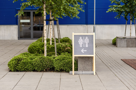 Sign at the supermarket with reference to toilet location - pictureの写真素材