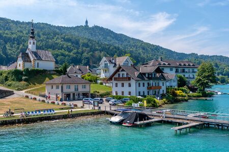 WORTHERSEE, AUSTRIA - AUGUST 08, 2018:  View of the Worthersee lake with Maria Worth church, Carinthia, Austriaのeditorial素材