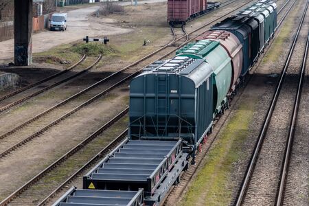 RIGA, LATVIA - MARCH 27, 2019: Freight trains on city cargo terminal - Imageのeditorial素材
