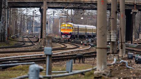 RIGA, LATVIA - MARCH 27, 2019: Passenger train approaches to the station - image
