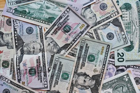 business, finance, investment, saving and corruption concept - money background from dollars usa