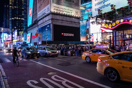 New York, USA - June 21, 2019: City lights and traffic in Manhattan during the evening hours.