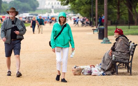 Washington DC, USA - June 9, 2019: Visitors to DC go for a stroll along the national mall. A...
